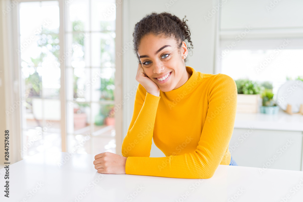 Beautiful young african american woman smiling cheerful, friendly face laughing confident Beautiful young african american woman smiling cheerful, friendly face laughing confident
