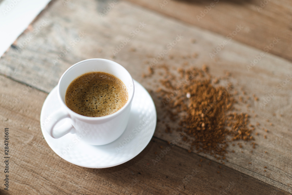 Obraz premium coffee cup served on table with coffee grinder