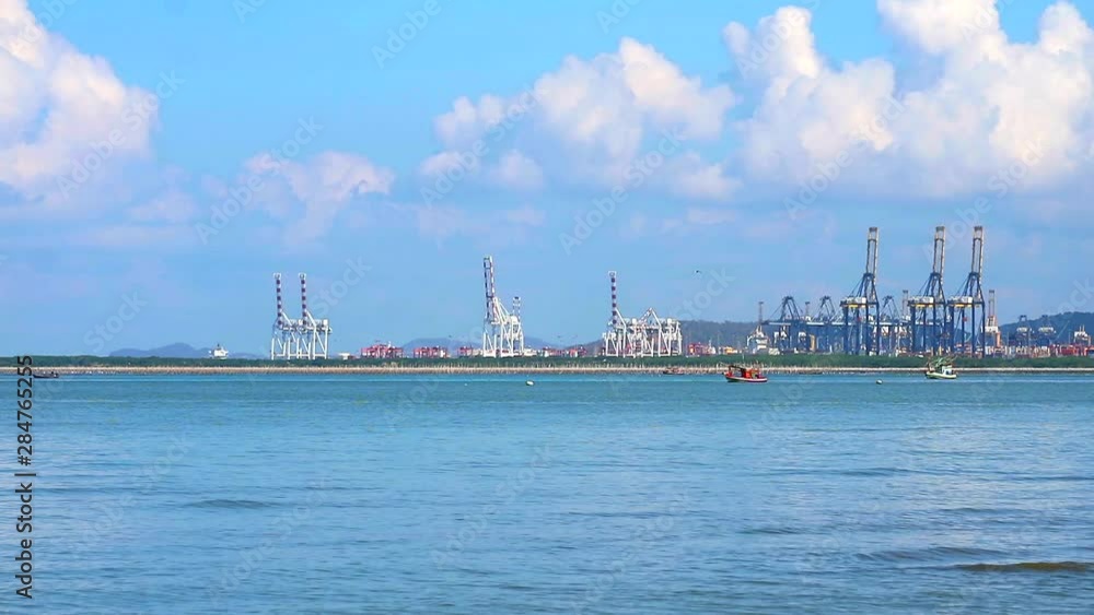 panning seaport and fishing boat parking on sea and bird flying blue sky white cloud panning seaport and fishing boat parking on sea and bird flying blue sky white cloud