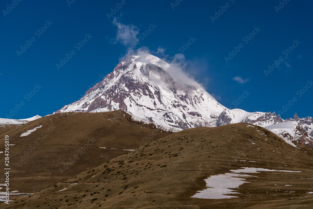 View of the snow-capped peak of Mount Kazbek