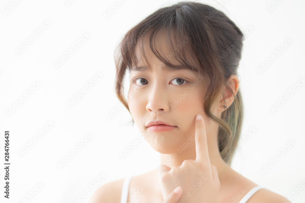 Beautiful portrait young asian woman with acne problem in the bedroom, trouble of beauty on face, zit treatment, asia girl is pimple having worry and displeased, skincare and healthy concept. Beautiful portrait young asian woman with acne problem in the bedroom, trouble of beauty on face, zit treatment, asia girl is pimple having worry and displeased, skincare and healthy concept.