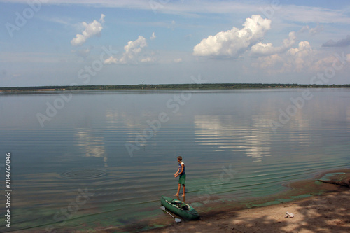 Boy near a river