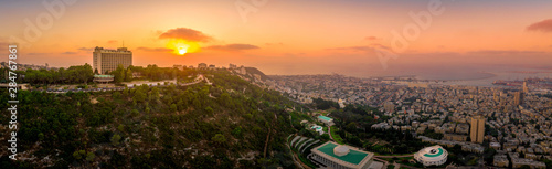Aerial panorama of sunset over Haifa and the Bahai temple complex in Israel