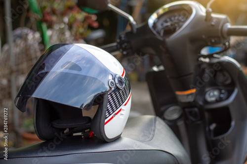 Helmet isolated on motorbike.  © NIKCOA