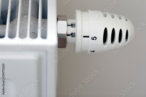Heating radiator with temperature regulator close-up