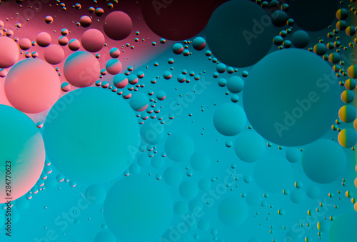 oil bubbles on a water surface with colorful abstract background