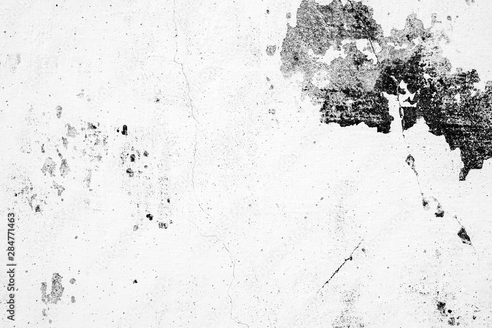 Texture of a concrete wall with cracks and scratches which can be used as a background Texture of a concrete wall with cracks and scratches which can be used as a background