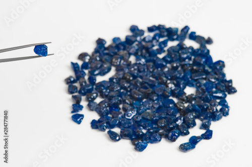 Collection of lovely blue rough and uncut sapphire gemstones.