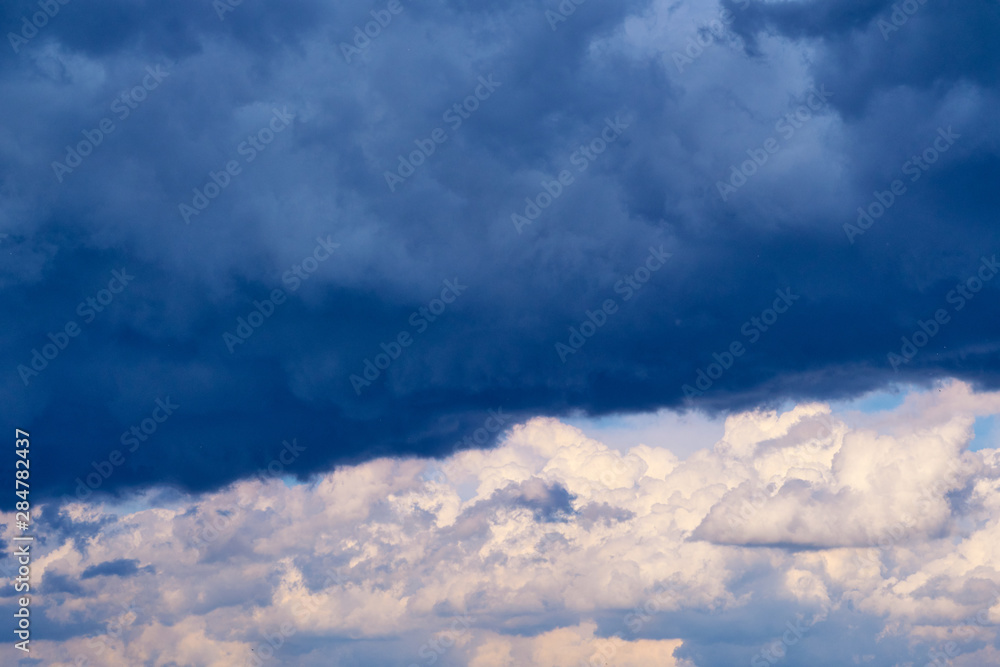 Clouds on the blue sky.