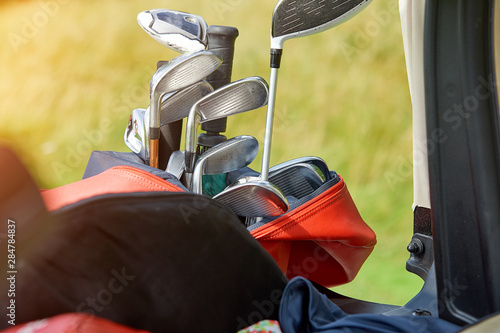 Golf bits in a bag. Golf equipment, royal game. Set of golf clubs.