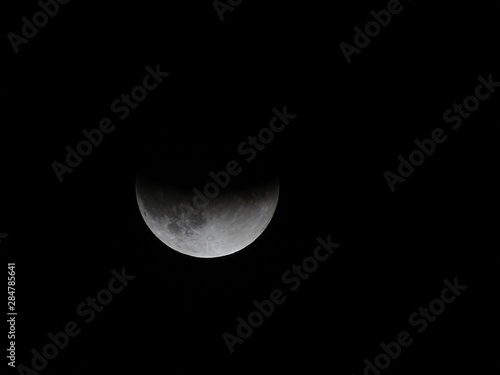 eclipse de luna parcial 16 julio 2019 desde la playa de cabopino marbella malaga photo