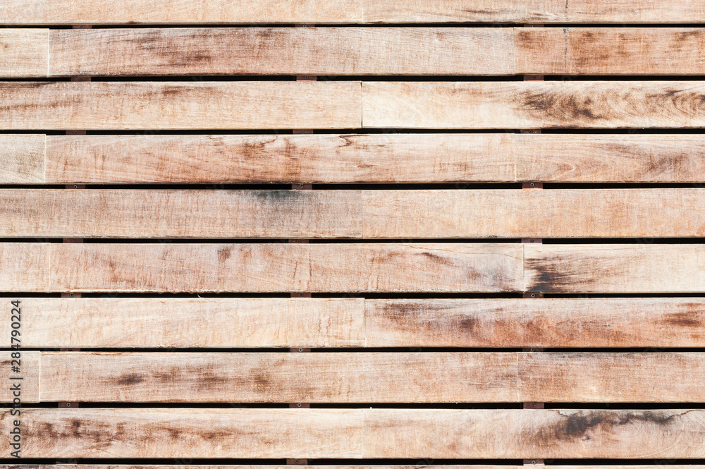 Fototapeta premium Texture formed by a wall of horizontal wooden slats.