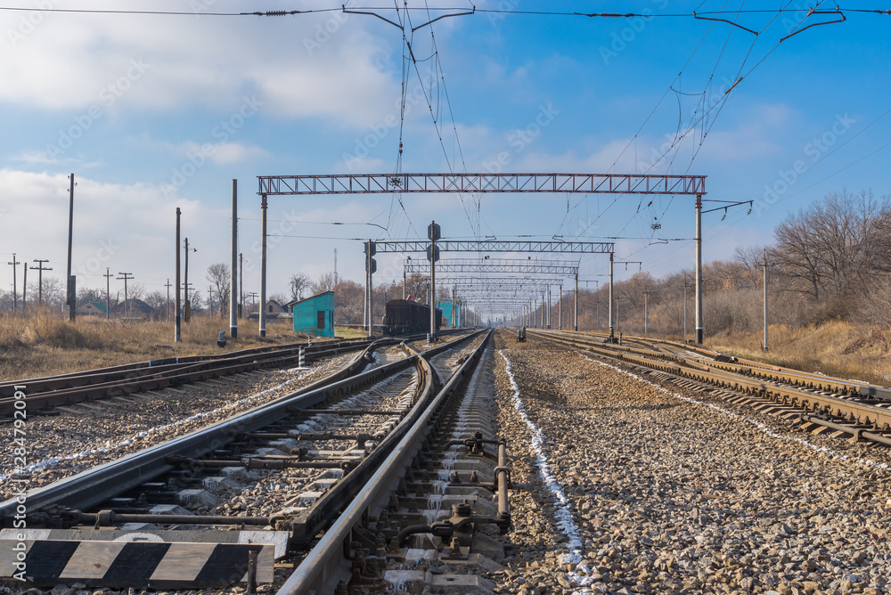 Landscape with railway infrastructure in central Ukraine at fall season