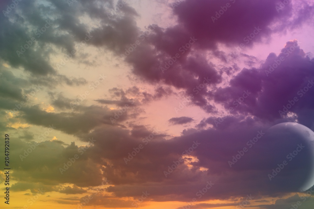 wonderful unreal vivid fantasy sun colored clouds on the sky for using in design as background. wonderful unreal vivid fantasy sun colored clouds on the sky for using in design as background.