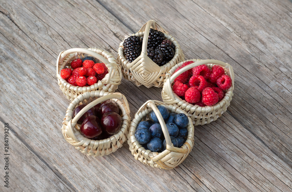 Ripe berries in small baskets Ripe berries in small baskets