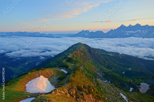 Aerial sunrise view from Rippetegg mountain to Dachstein mountain range in Styria, Alps, Austria © Tom