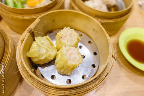 chinese crab steamed dumpling Dim Sum in Bamboo Steamer Basket.