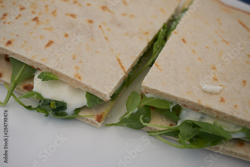 piadina romagnola with squacquerone cheese and rocket