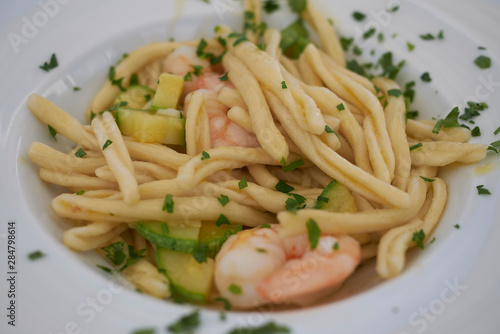 Strozzapreti pasta with zucchini and shrimps