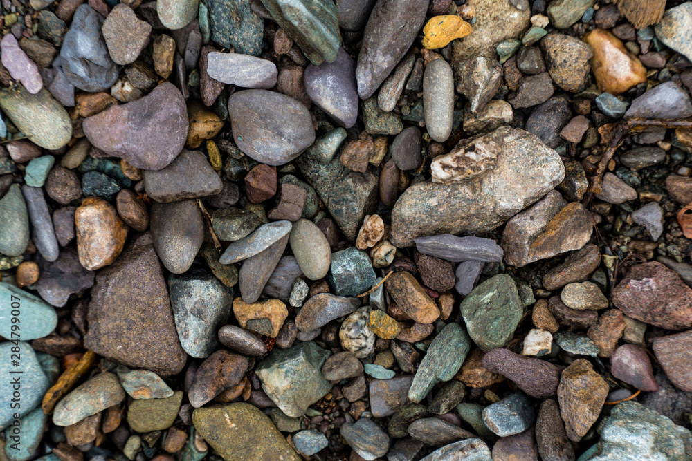 The texture of a shallow river stone. Pebble Background Image