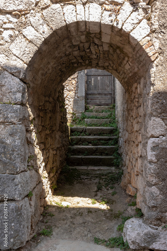 Old stone entrance to the ancient house in medieval town Beli on island Cres  Croatia