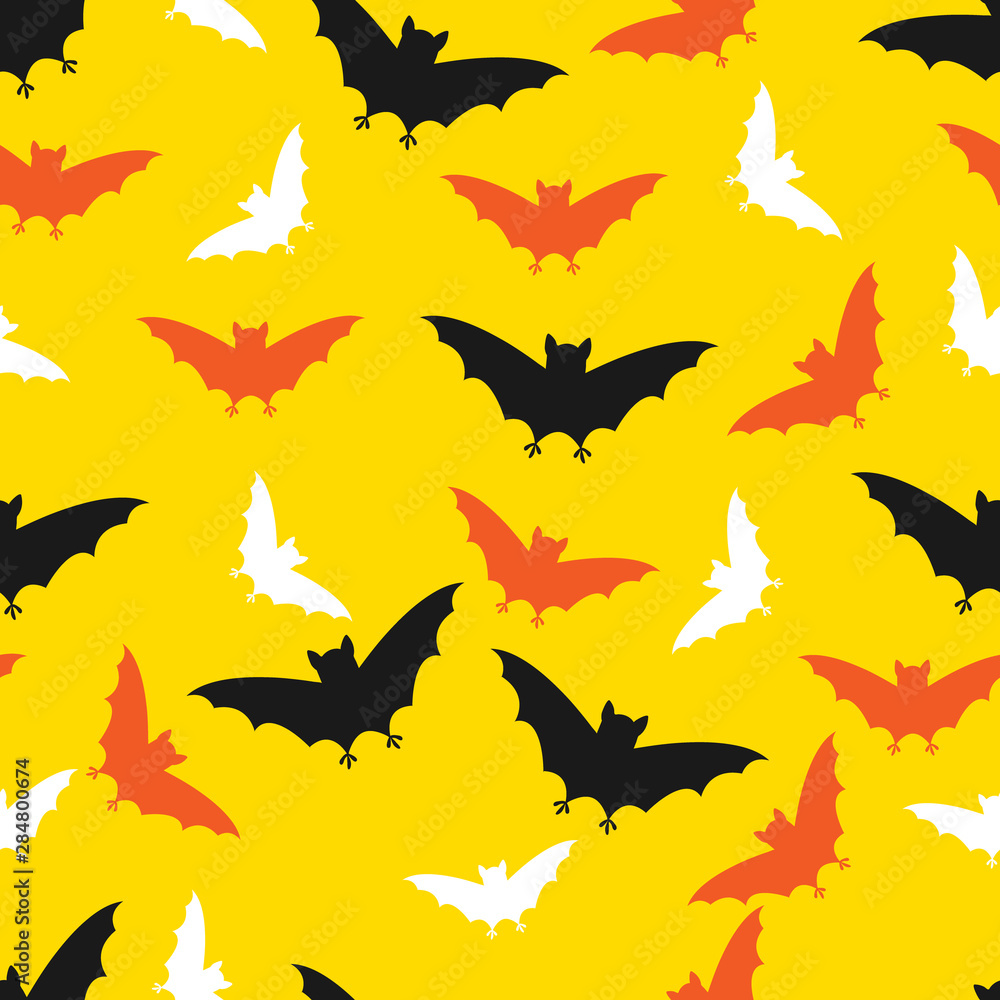 Vector seamless halloween pattern with hand draw silhouette of orange, black and white bats on yellow background for wrapping, textile or packaging Vector seamless halloween pattern with hand draw silhouette of orange, black and white bats on yellow background for wrapping, textile or packaging
