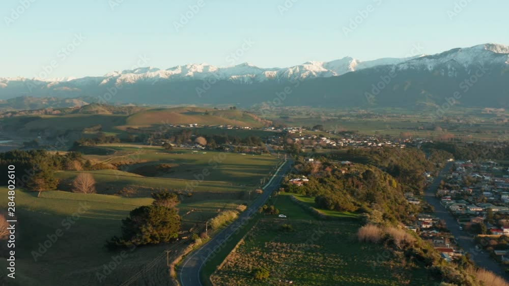 Sunrise over Kaikoura mountains and New Zealand small town 4k Sunrise over Kaikoura mountains and New Zealand small town 4k