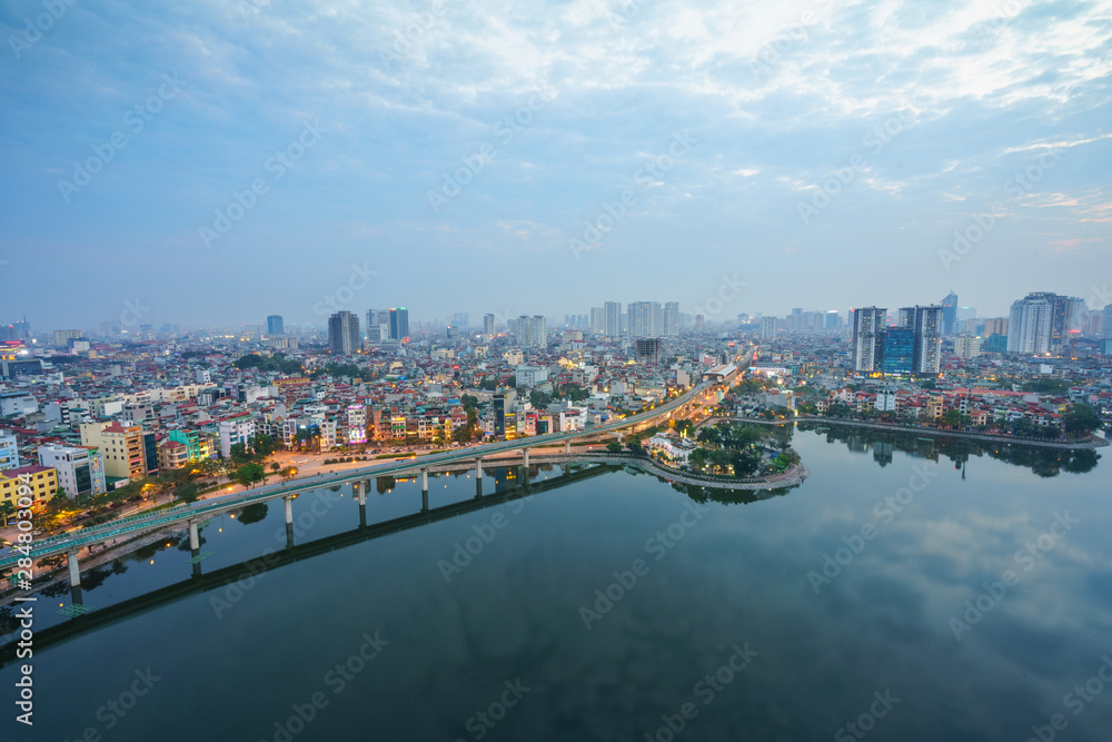 Aerial skyline view of Hanoi city, Vietnam. Hanoi cityscape by sunset period at Hoang Cau lake, Dong Da district
