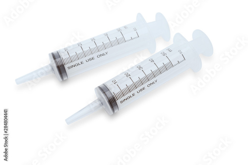Blank plastic syringe without injection needle isolated on white background