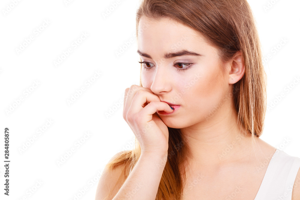 Teenage woman looking worried, thinking about something Teenage woman looking worried, thinking about something