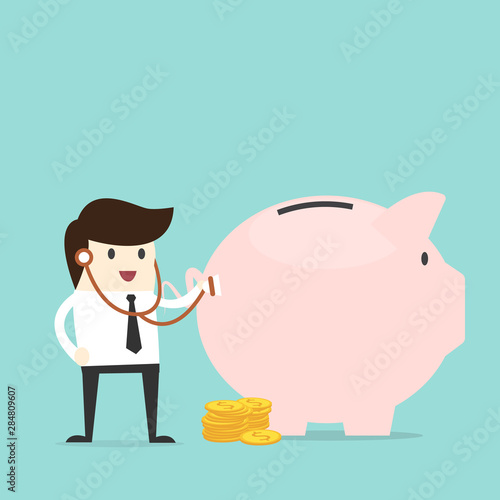 Financial health check. Businessman using stethoscope to check money health