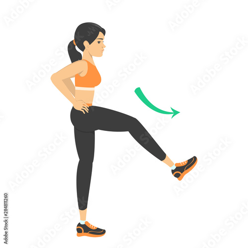 Woman doing leg swing exercise. Warm-up before workout