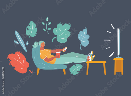 Woman watching TV sitting on couch at home