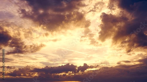 Fantasy dusk. Dynamic clouds before sunset