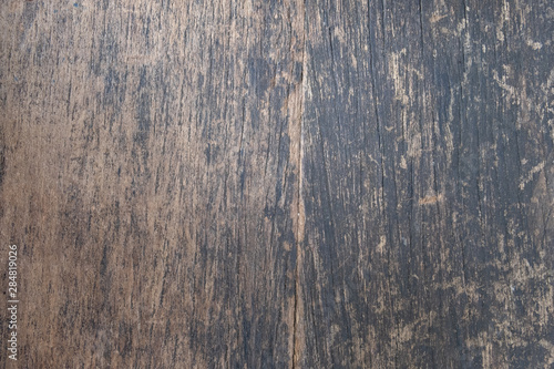 Surface of old plank with stain black. image in dark tone. for empty and copy space background.