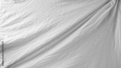 White crumpled textile, fabric background and texture