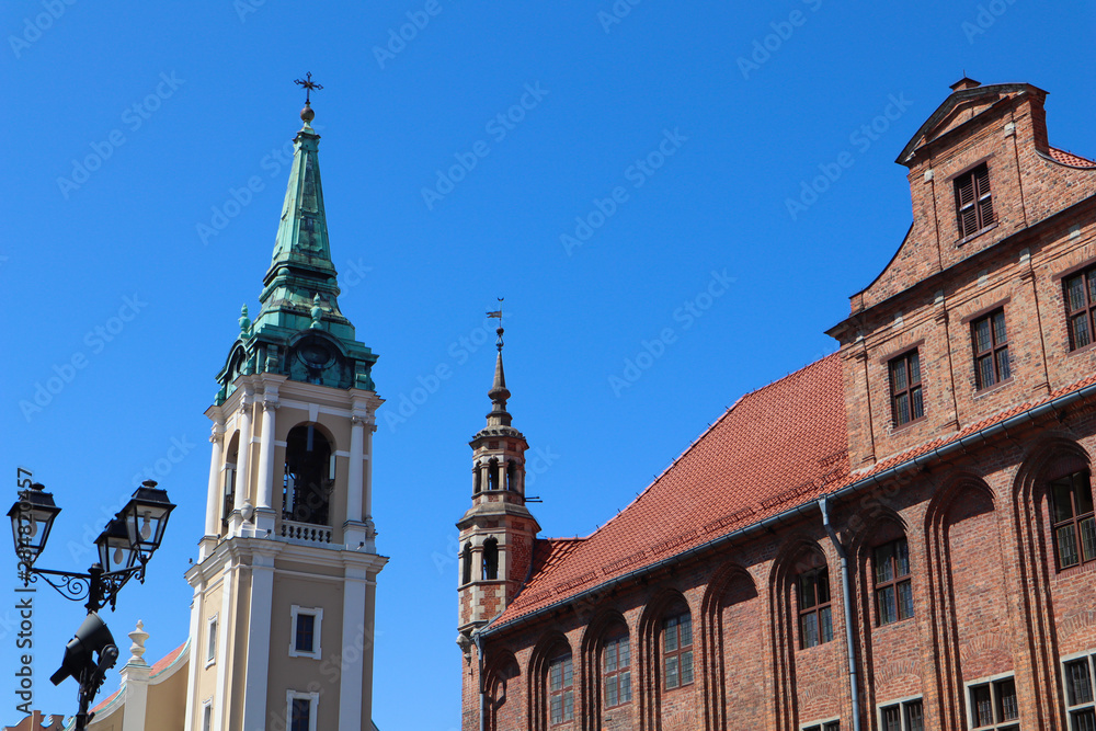 The Gothic Old Town Hall (Ratusz Staromiejski), Holy Spirit Church in Torun, Poland. August 2019