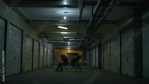 Helpless young men hands tied with rope photo