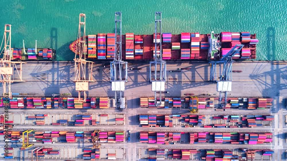 4K Timelapse of modern industrial port with containers from top view or aerial view. It is an import and export cargo port where is a part of shipping dock.Singapore