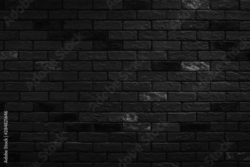 Dark black brick wall background