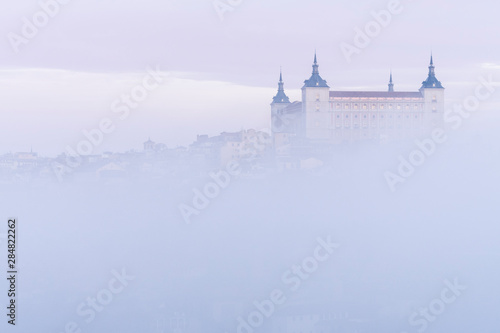 Views of the beautiful city of Toledo (Spain) bathed in fog