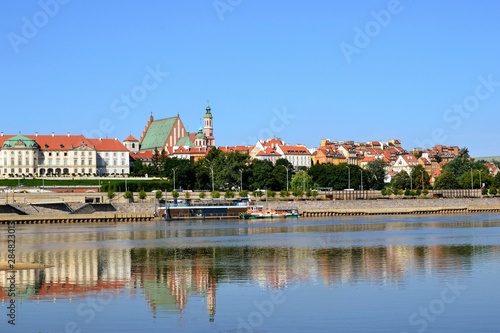 Warsaw's Royal Castle and Old Town, view from the Vistula (Wisla) river. Vistula river and Warsaw Old Town skyline. Warsaw, Poland