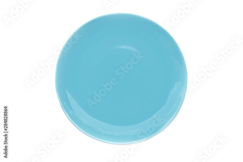 Empty blue ceramic round plate isolated on white background.