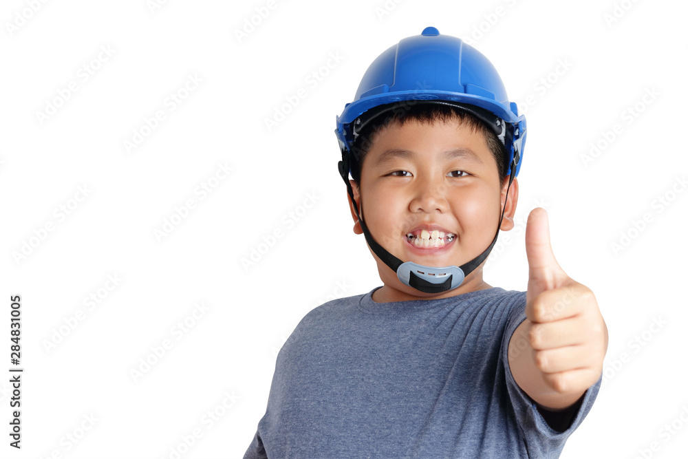 Asian boys wear blue safety hats with smiles and thumbs up. isolated Asian boys wear blue safety hats with smiles and thumbs up. isolated