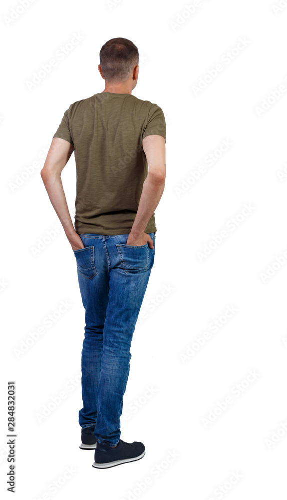 Back view of man in jeans. Back view of man in jeans.