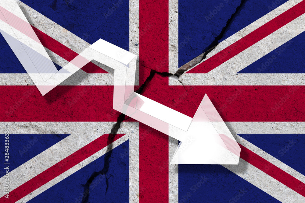 Fototapeta premium United Kingdom on the cracked wall with arrow falling down. Concept of decrease in the UK.
