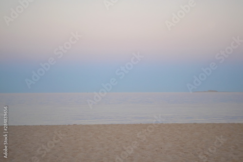  Sunset at sea. The shore of the Red Sea. Sand beach. Coast.