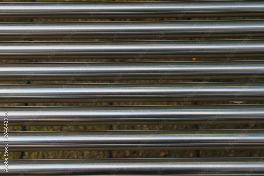 close-up of metallic tubes close-up of metallic tubes