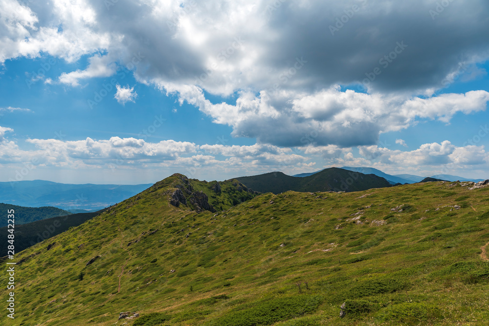 Summer panoramic view from Old mountain ( Stara planina), Bulgaria. Central Balkan national park, Kozia stena (goat wall) reserve. Summer panoramic view from Old mountain ( Stara planina), Bulgaria. Central Balkan national park, Kozia stena (goat wall) reserve.