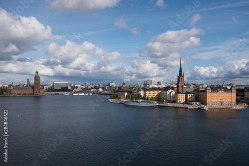 Sunny view over Riddarholmen at the lake Mälaren in Stockholm a summer day 